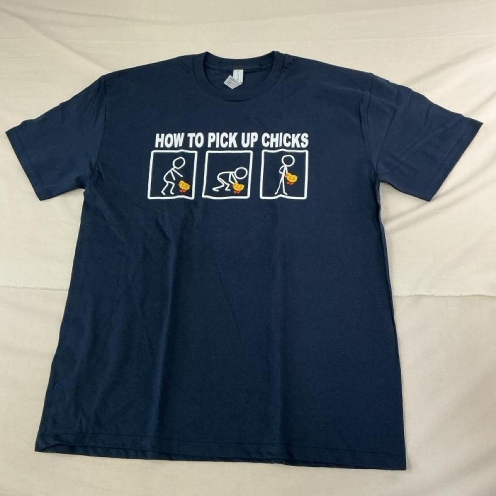 Funny novelty graphic tee featuring‎ the phrase "How to Pick Up Chicks"